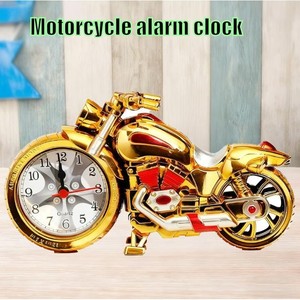 REVEIL MOTO A LA MODE ET CREATIF